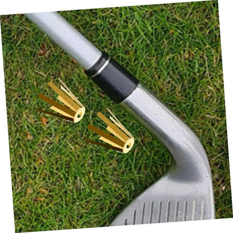Universal Brass Golf Shaft Adapter Shims And Octopus Spacers Rig Ready Pack Of Five Durable Fittings next to golf club on grass.