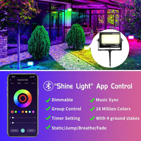 4 Pack RGB LED Flood Lights With Stake Outdoor Color Changing Party Lights 150W Equivalent Dimmable White Light 2700K 6500K RGB Uplighting For Events App Control Via Bluetooth shown lighting up a garden with a smartphone app interface.