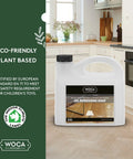 Oil Wood Floor Cleaner And Rejuvenator For Oiled Finishes Plant Based Low VOC bottle in a modern kitchen setting.