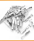 Close-up of metal terminal pins from the 945 Pcs Pin Connector Kit With 21 Types Terminal Pins And Waterproof Plugs For Car Wiring.