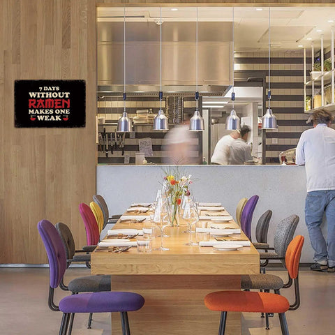 Funny Ramen Vintage Metal Sign 8x12 Inch Tin Wall Art for Kitchen, mounted in a modern dining area with chefs in background.
