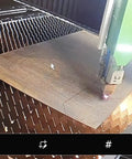 Laser cutting machine creating Four Pack AR500 Laser Cut Steel Shooting Target Gongs, Three-Inch By Quarter-Inch.