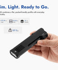 Person holding Rechargeable Flashlight With 1300 Lumens, 118 Meter Throw, Six Modes, 3 in 1 White LED UV Blacklight 365nm and Green Light