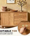 Hand holding handle on drawer with Six Piece Brass Cabinet Backplates Set 1 Inch For Doors Drawers Cupboards And Closets