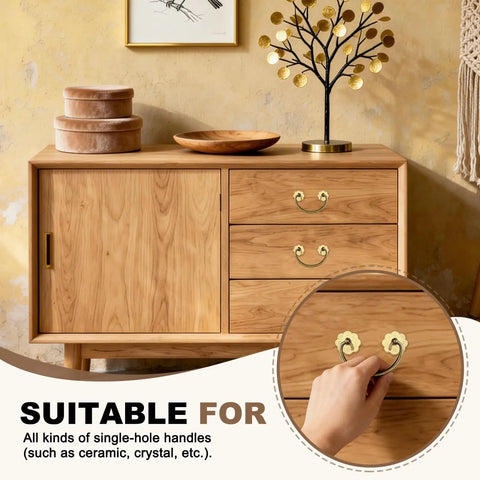 Hand holding handle on drawer with Six Piece Brass Cabinet Backplates Set 1 Inch For Doors Drawers Cupboards And Closets