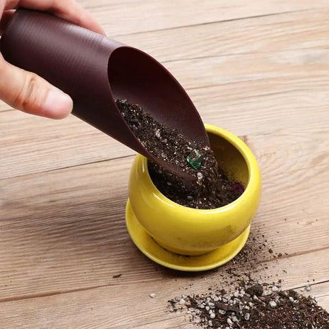 Go-To Reusable Plastic Garden Shovel Cup For Bonsai And Potted Plants 16x6 cm Cultivation Tool Spade Soil Scoop For Succulents And Fleshy Plants Handy Garden Care Essential For Plant Lovers in use filling a small yellow pot