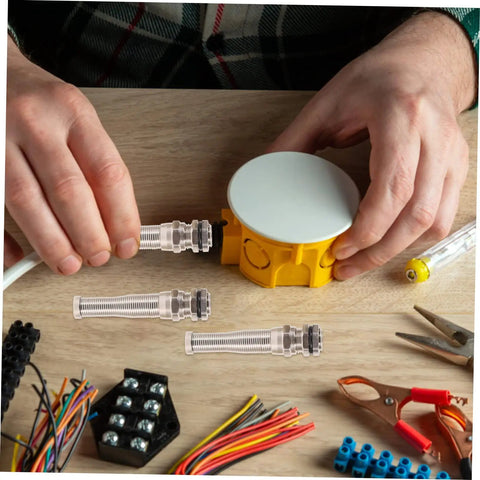 Brass Cable Glands Kit 4 Pack With 2 Way Glands And Metal Connectors used in electrical box wiring setup on table
