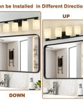 Five Light Modern Vanity Light Fixture In Black Metal With White Marble Glass E26 Base Sleek Minimalist Bathroom Vanity Wall Lamp shown installed upward and downward above a mirror in a bathroom setting.