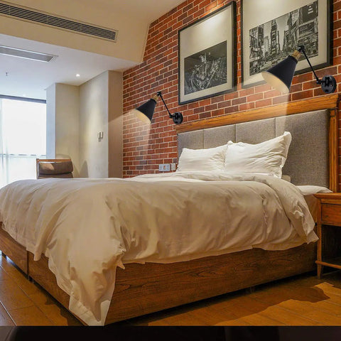 Bedroom showing Vintage Industrial Wall Sconce Light Set of Two With Adjustable Swing Arm in Bronze Finish
