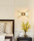 Dope Gold Sunburst Wall Sconce Two Light Fixture For Bathroom And Living Spaces, brass lighting above bedroom bedside table