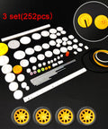18 Piece 3V DC Motor Kit For STEM Projects And Toys With 24000 RPM Gear Train 252 Plastic Gears Includes 2 AA Battery Holder And Wires Kid Friendly Fun Hands On Learning Set, showing 252 plastic gears and wheels on black background