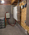 No Sweat 500A DC Combiner Box 4 To 2 Out Pre Wired Cable Kit for 48V Lifepo4 Battery Bank in basement setup.