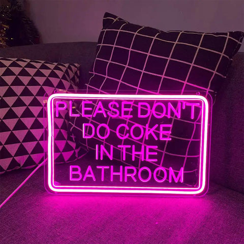 Please Dont Do Coke In The Bathroom 3D Art Carving Neon Sign Pink LED USB Wall Decor on couch with geometric pillows