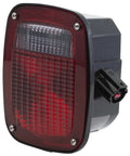 Ford Truck Passenger Side Stop Tail Turn Box Light With Integrated License Plate Cutout showing red lens and plug for installation.