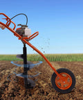 Kebayuneth 63CC gas-powered earth auger with orange frame and single wheel; angled side view showing 3.15-in drill bit.