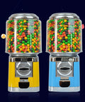 Two Automatic Candy Dispenser Machines For Home And Shop Use, yellow and blue, alloy body, filled with colorful candies.