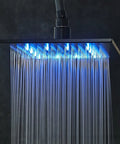 UMJIGF Shower System Black Shower Faucet Set with Led Digital Display, close-up of blue LED waterfall shower head.