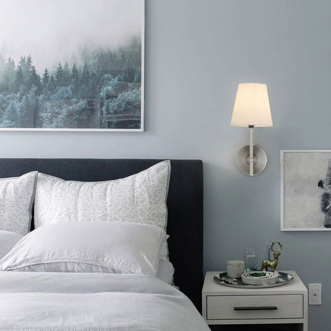 1 Light Wall Sconce With Plug In Or Hardwired Install In Brushed Nickel Finish White Alabaster Fabric Shade Vanity Light For Bathroom Or Bedroom, Clean Modern Transitional Wall Mount Lamp next to a bed