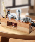 Solid Wood Espresso Tamper Holder 58Mm With Integrated Drip Tray Natural Coffee Tamping Station with tools on a wooden counter.
