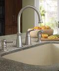 Top Shelf High Arc Kitchen Faucet With Spot Resist Stainless Finish And Smooth One Handle Design To Make Kitchen Chores An Absolute Breeze On Your Counter, viewed from the side on a kitchen countertop.