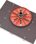 Knockout Rock Solid Micro Dot Drill Press Table Kit with red circular base and secure screws on a flat surface.