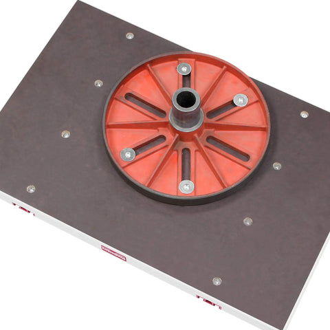 Knockout Rock Solid Micro Dot Drill Press Table Kit with red circular base and secure screws on a flat surface.