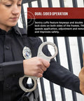Police officer holding Stainless Steel Handcuffs For Law Enforcement Heavy Duty Professional Grade with dual keyways