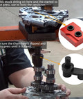 Front view of Harley Twin Cam camshaft bearing remover/installer tool kit with red block and black puller on engine head.