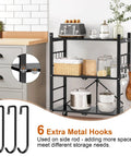 3 Tier Foldable Metal Storage Shelves With 6 Hooks And Wheels in kitchen with various items and utensils, sturdy black rack