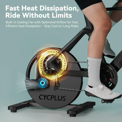 Smart Indoor Bike Trainer With 2200W Brushless Motor 19 Percent Gradient Simulator Virtual Shifting And Uphill Downhill Simulation Ultra Quiet Ride Zwift And MyWhoosh Compatible BLE And ANT Plus Ready Cassette Not Included shown from side with cooling fan