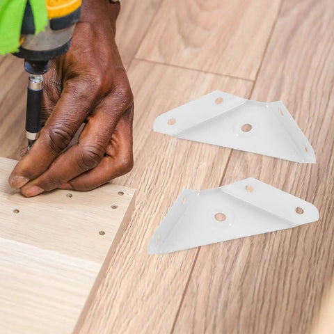 Person installing 12 Piece Triangle Steel Cabinet Corner Brackets 90 Degree Three Sided Fixed Design Shelf Supports for Wood Furniture.