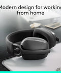Zone Vibe 100 Wireless Over Ear Headphones With Noise Canceling Microphone for All Day Work and Play, on desk, Graphite.