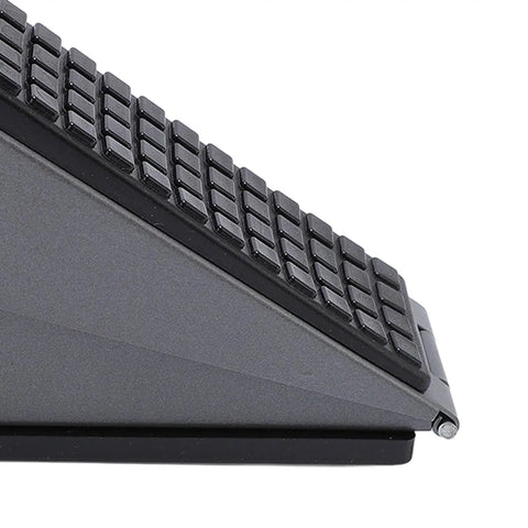 Close-up of Heavy Duty Stainless Steel Spring Door Stop for Home and Office, textured surface, adjustable bottom guard.