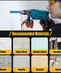 Blue cordless power drill with a diamond-tipped bit drilling into a white wall.