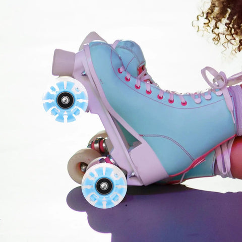 Close-up of roller skate with Luminous Roller Skate Wheels 4 Pack PU Light Up Quad Skates Wheels For Outdoor Skating Durable Wear Resistant Replacement Parts With Blue Glow For Adults