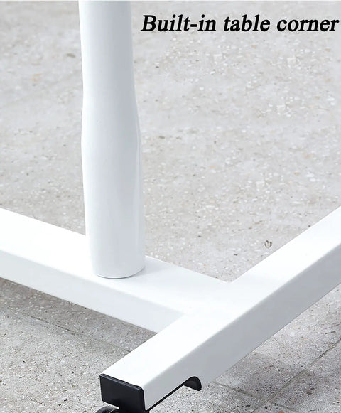 Detail of the built-in corner on the No Sweat Height Adjustable Laptop Desk, featuring sturdy white metal construction.