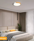 Sleek Modern LED Ceiling Light Fixture With Wood Style Flush Mount Circular Acrylic Lampshade 11.8 Inch installed in bedroom