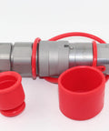 1/2 in NPT flat-face hydraulic quick-connect coupling with two red protective caps, metal body.
