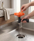 Heavy Duty Manual Drain Snake Auger For Home Plumbing Quick Clog Remover With Ergonomic Grip aluminum alloy tool in sink.