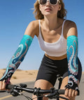 Premium Ice Silk Arm Sleeves Deliver Ultra Fly Compression Fit To Block Harsh Sunlight And Keep Your Forearms Cool And Sweat Free On Daily Chores With Upf50 Protection on a cyclist.