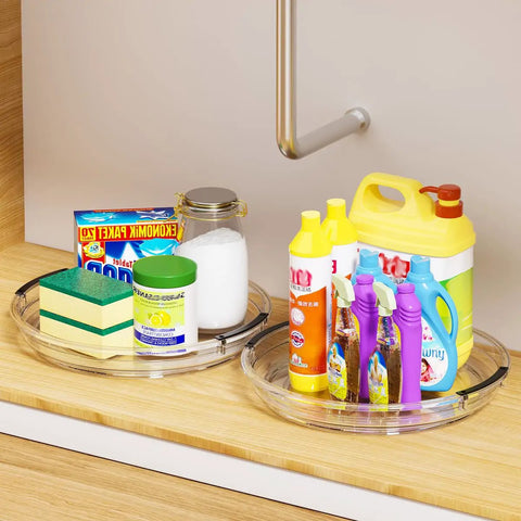 Clear acrylic Lazy Susan turntables with cleaning supplies on kitchen counter; Three Pack Lazy Susan Turntable Organizer For Kitchen Storage Rotating Spice Rack Clear Acrylic 9.25, 10.6, 12 Inches Pantry Cabinet Fridge Countertop Condiment Holder For Spices Seasonings Snacks Easy Spin