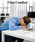 Man sleeping with 3D Eye Mask For Sleep And Travel For Men And Women, 100 Percent Pressure Free Contoured Eye Pockets in office