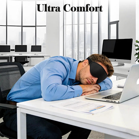 Man sleeping with 3D Eye Mask For Sleep And Travel For Men And Women, 100 Percent Pressure Free Contoured Eye Pockets in office