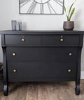 Black dresser refinished with All In One Refinishing Paint For Furniture Cabinets And More Gallon Licorice No Stripping No Sanding No Priming Needed Quick Application And Rich Durable Finish For Dyi Makeovers in a room.