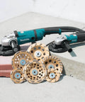 Low Vibration Diamond Cup Wheel 4.5 Inch Turbo Rim 8 Segment alongside grinding tools on concrete surface
