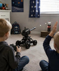 Children playing with 360 Degree Drifting RC Tank Kit For Teens And Beginners, Hands On STEM Robot Project With Simple Coding on carpet.