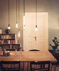 Hanging Edison bulbs in dining area with 100-Piece Plastic Cable Gland Kit For DIY Hanging Lights And Ceiling Installations Cable Grips Connectors