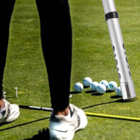 Close-up of Golf Ball Retriever Tube, Detachable Picker Upper For Golf Balls, Aluminum Alloy Shag Bag System Holds Up To 24 Balls on green