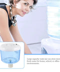 8L Plastic Water Storage Carrier With Lid Portable Water Jug For Home And Office Use beside a water dispenser