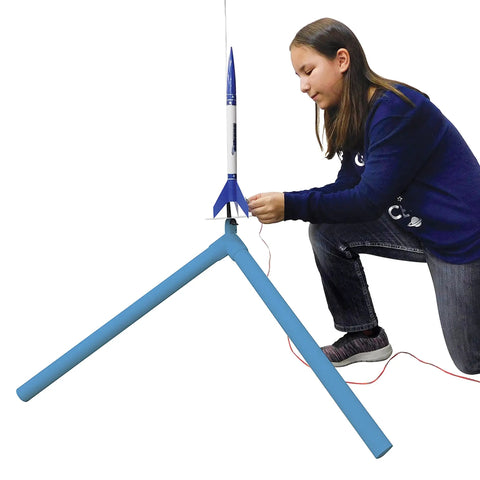 Child setting up rocket on PS II Model Rocket Launch Pad For Mid Powered Rockets Ready To Blast Off With A 60 Inch Threaded Steel Launch Rod PVC Leg System And A 5 Inch Galvanized Mount Essential Rocket Kit Accessory For Ages 10 And Up